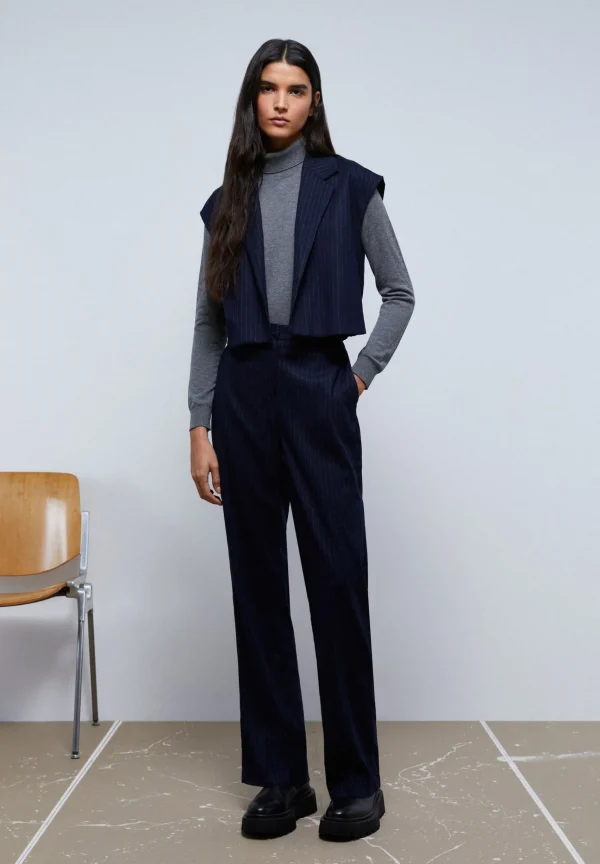scalperscompany Chaleco Raya Diplomatica-Mujer Total Look